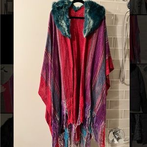 Woven fringed striped poncho with fur collar